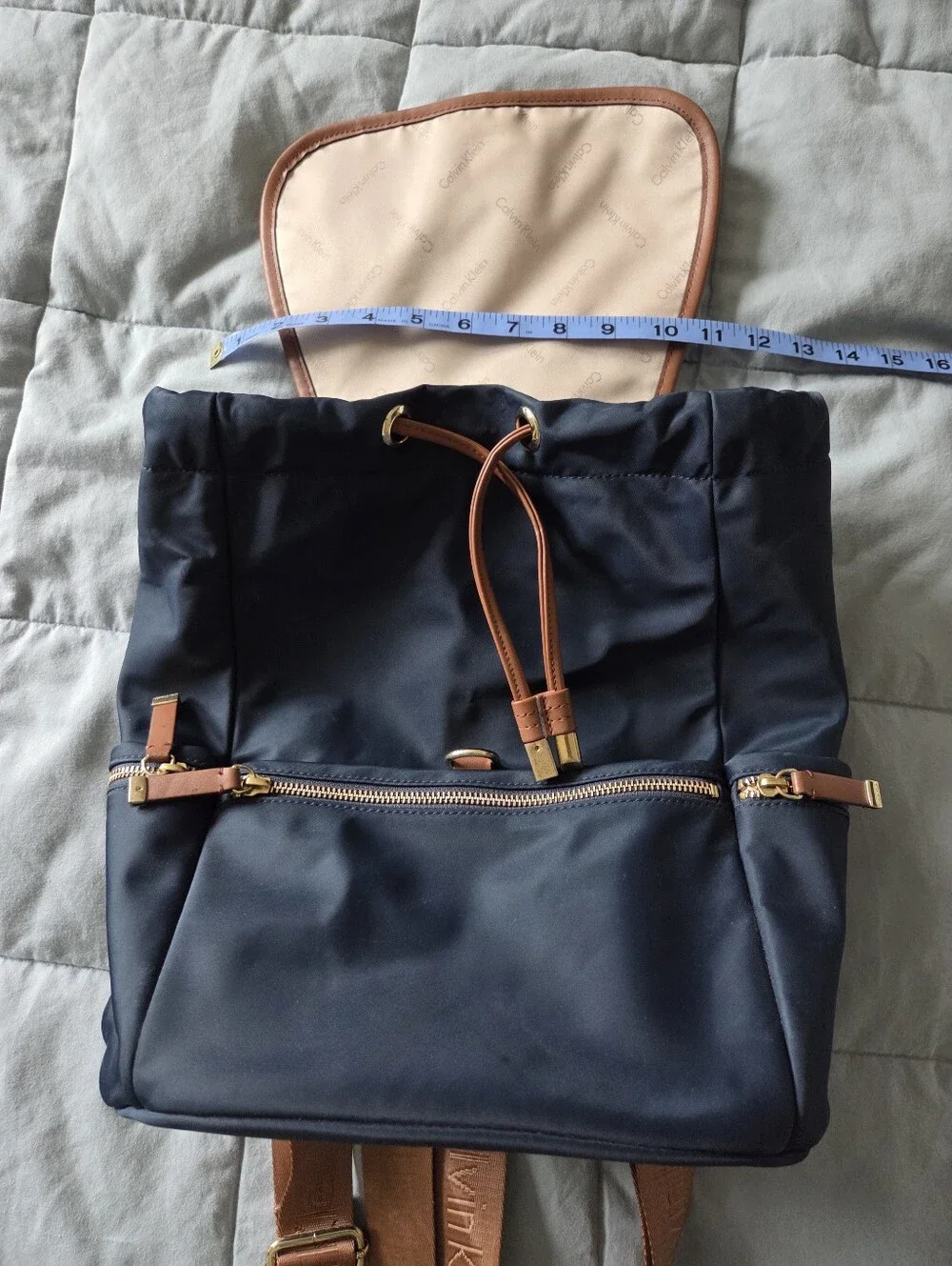 Calvin Klein Navy Blue Backpack with Brown Trim